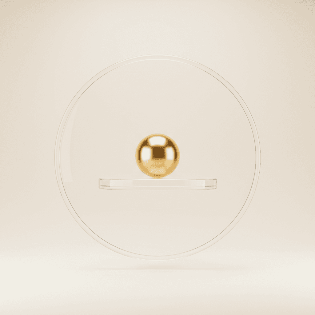 A gold sphere resting on a glass disc inside a clear ring