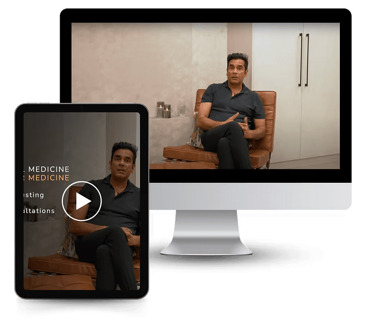 Levitas Academy podcast video shown on a desktop monitor and a tablet, with Dr Ash Kapoor seated in an armchair